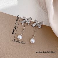 1 Pair Elegant Romantic Bow Knot Plating Inlay Alloy Artificial Rhinestones Artificial Pearls White Gold Plated Drop Earrings main image 2