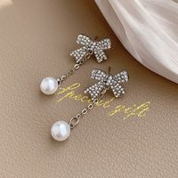 1 Pair Elegant Romantic Bow Knot Plating Inlay Alloy Artificial Rhinestones Artificial Pearls White Gold Plated Drop Earrings main image 4