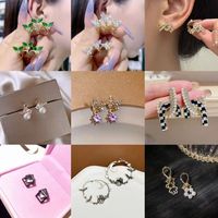 1 Pair Casual Glam Simple Style Moon Butterfly Bird Plating Inlay Alloy Rhinestones 14k Gold Plated Ear Studs main image 1