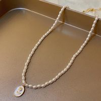 Glam Retro Heart Shape Bow Knot Imitation Pearl Beaded Plating Inlay Rhinestones Women's Layered Necklaces sku image 4