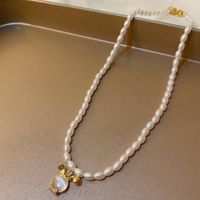 Glam Retro Heart Shape Bow Knot Imitation Pearl Beaded Plating Inlay Rhinestones Women's Layered Necklaces sku image 13