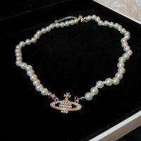 Glam Retro Herzform Bogenknoten Imitationsperle Perlen Überzug Inlay Strasssteine Frau Geschichtete Halskette sku image 8