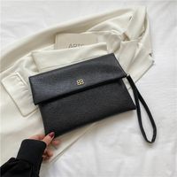 Women's Medium Pu Leather Solid Color Streetwear Magnetic Buckle Envelope Bag sku image 4