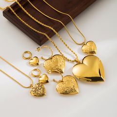 estilo ig forma de corazón acero inoxidable enchapado embutido circón chapado en oro de 18 quilates. aretes collar
