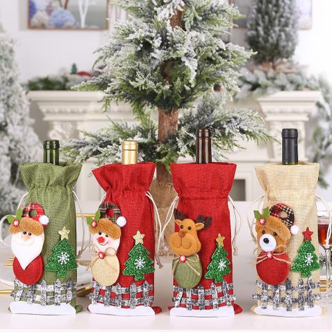 New Christmas Decorations Sackcloth Snow Cartoon Drawstring Wine Bottle Cover Lattice Doll Wine Bottle Bag Wholesale