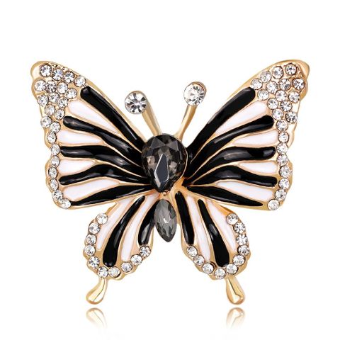 Neuer Europäischer Und Amerikanischer Modeschmuck Schwarz Schmetterlings Tropfen Öl Diamant Corsage Weibliche Legierung Diamant Galvanik Kc Spot