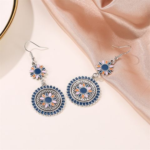 New Retro Palace Style Carved Metal Flower Totem Earrings Color Dripping Long Small Daisies Wholesale Nihaojewelry