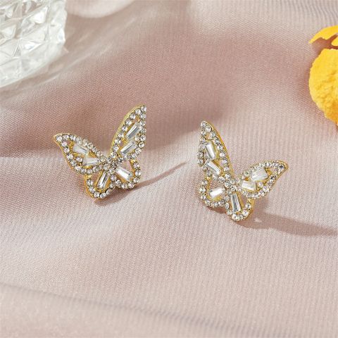 Nueva Moda Simple Circón Mariposa Damas Pendientes De Aleación De Cristal Salvaje Al Por Mayor