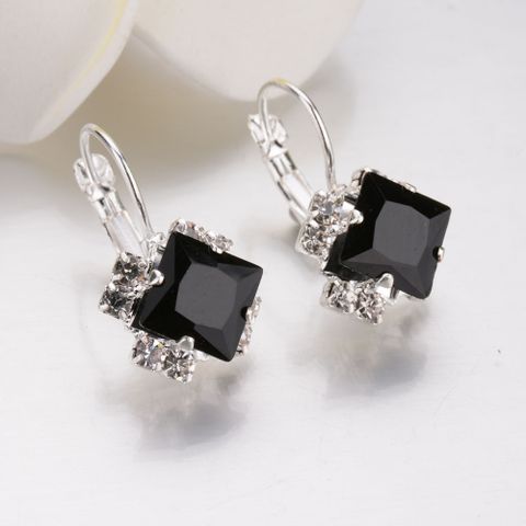 Occident Alloy Inlaid Imitated Crystal Earrings ( White ) Nhbq0199