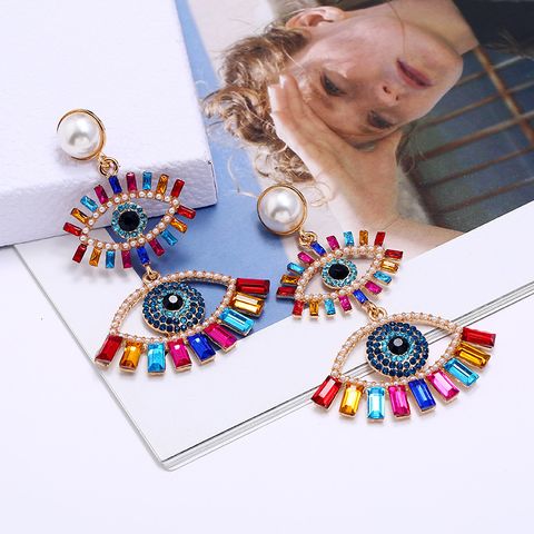 Fashion Eye Diamond Alloy Artificial Gemstones Earrings