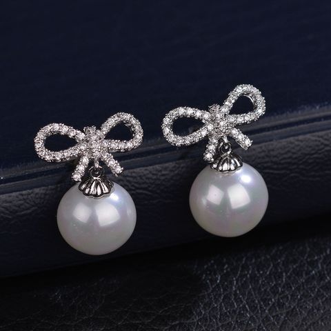 1 Pair Elegant Bow Knot Inlay Copper Alloy Artificial Pearls Zircon Drop Earrings