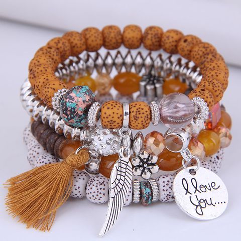 Fashion Disc Heart Wings Tassels Beads Multi-layered Bracelet Wholesale