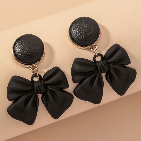 Leather Button-shaped Bow Earrings