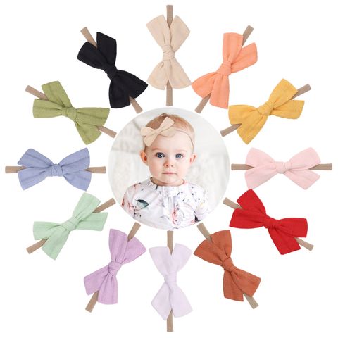 Wholesale Pure Color Cotton Bowknot Baby Hairband Nihaojewelry