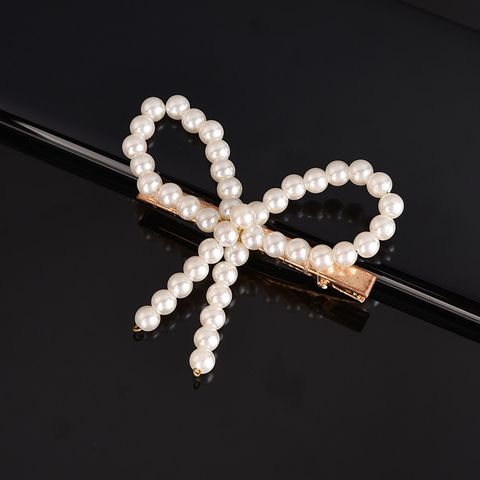 Simple Style Geometric Bow Knot Imitation Pearl Alloy Plastic Hair Clip 1 Piece