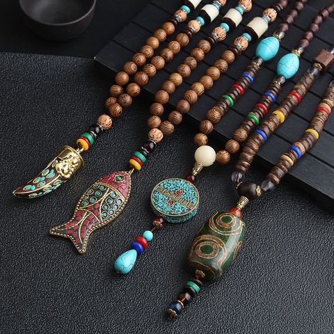 Ethnischer Stil Runden Fisch Legierung Holz Perlen Überzug Unisex Halskette Mit Anhänger 1 Stück