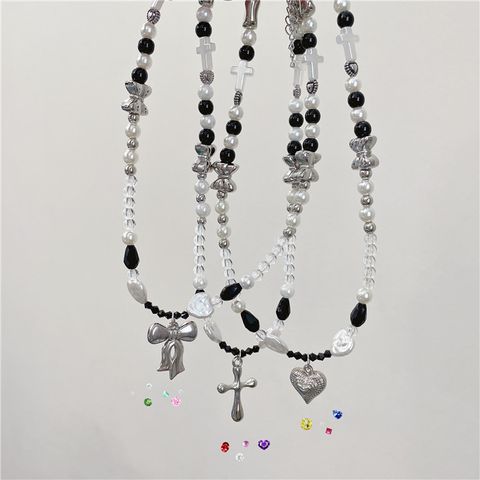 Fashion Cross Bow Knot Beaded Artificial Pearls Women's Necklace