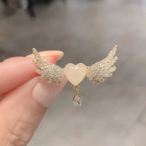 Elegante Glamour Forma De Corazón Alas Aleación Embutido Circón Mujeres Broches