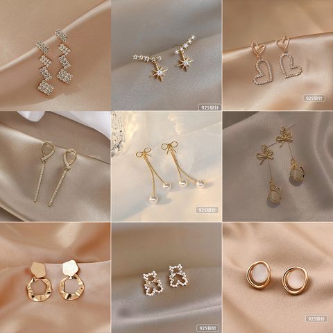 Simple Style Star Heart Shape Bow Knot Alloy Inlay Artificial Pearls Zircon Women's Earrings 1 Pair