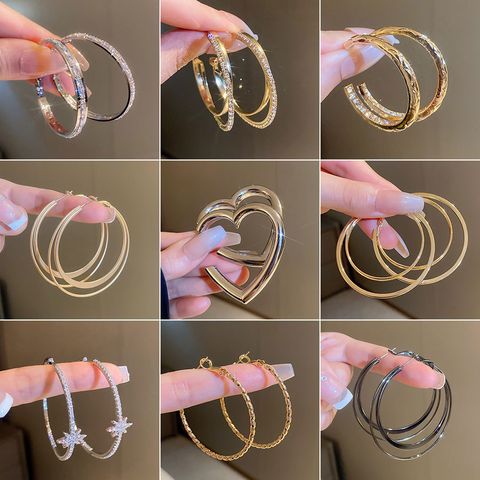 Fashion Geometric Heart Shape Metal Inlay Artificial Pearls Rhinestones Women's Hoop Earrings 1 Pair