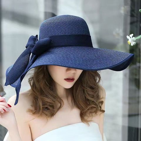 Women's Vacation Solid Color Bowknot Big Eaves Straw Hat