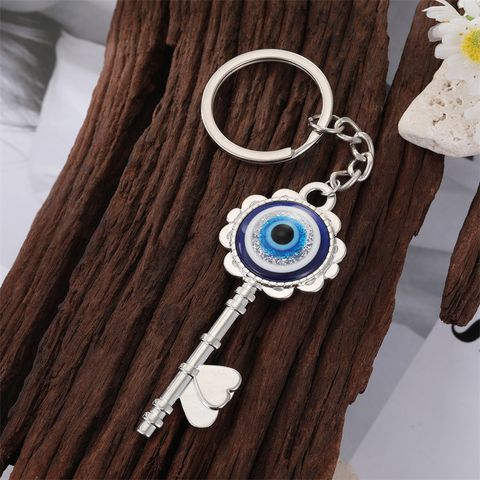 Fashion Alloy Inlaid Eye Shaped Keychain Gold Plated Bag Pendant Accessories