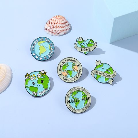 Cartoon Style Earth Heart Shape Alloy Stoving Varnish Brooches