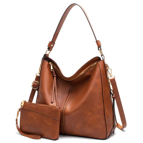 Women's Large Pu Leather Solid Color Fashion Tassel Square Zipper Crossbody Bag