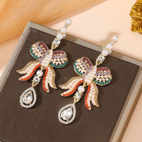 1 Pair Classical Romantic Bow Knot Inlay Alloy Pearl Gold Plated Drop Earrings