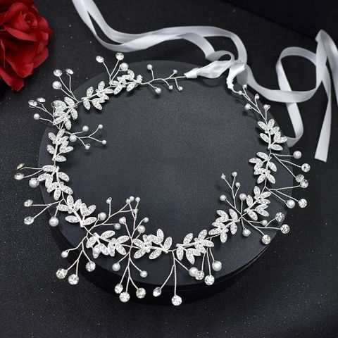 Simple Style Waves Solid Color Alloy Plating Inlay Rhinestones Pearl Hair Band