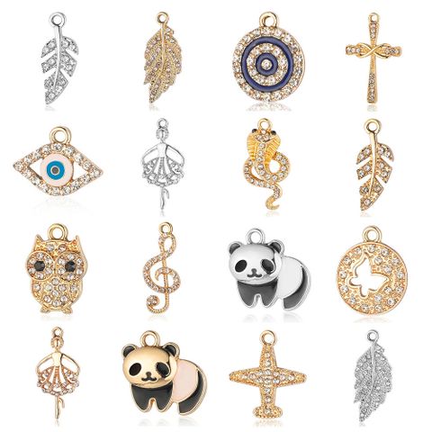 Simple Style Cross Panda Eye Alloy Plating Inlay Zircon Gold Plated Silver Plated Charms Jewelry Accessories