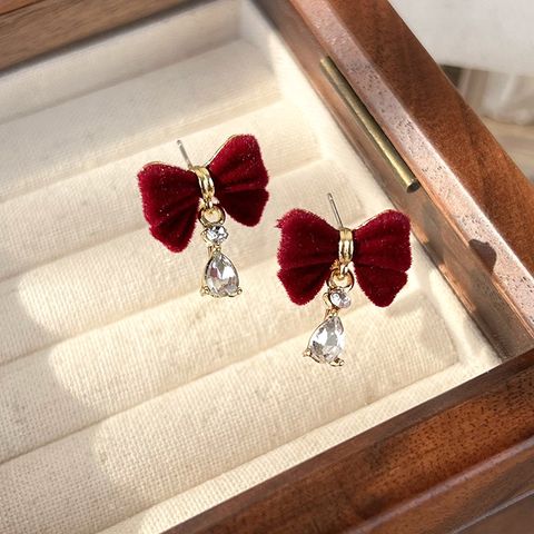 1 Pair Vintage Style Bow Knot Plating Alloy Flocking Gold Plated Drop Earrings