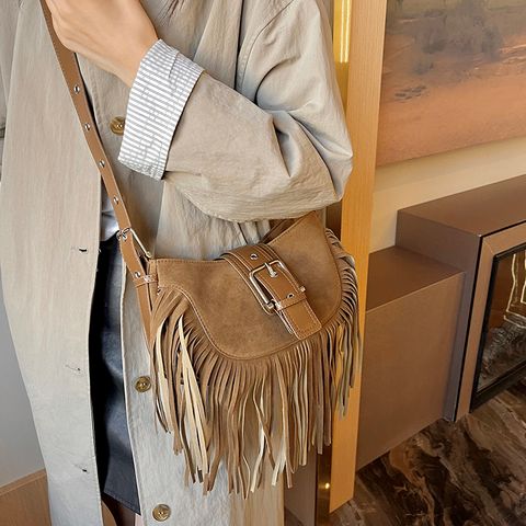 Women's Pu Leather Solid Color Vintage Style Classic Style Streetwear Tassel Sewing Thread Dumpling Shape Zipper Magnetic Buckle Shoulder Bag