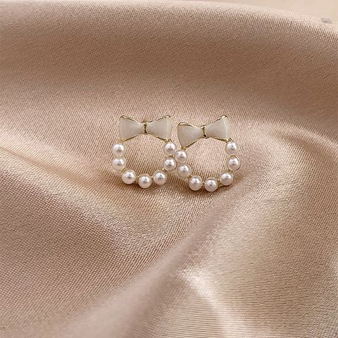 1 Pair Korean Style Bow Knot Inlay Alloy Artificial Pearls Gold Plated Ear Studs