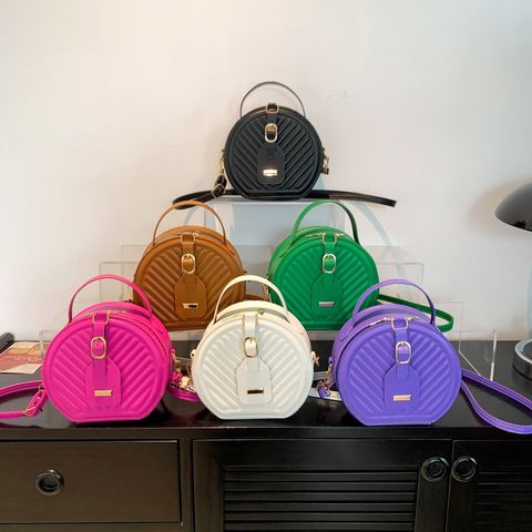 Women's Pu Leather Solid Color Elegant Round Zipper Handbag