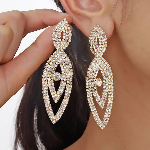 1 Pair Casual Simple Style Shiny Tassel Hollow Out Alloy Crystal Gold Plated Drop Earrings