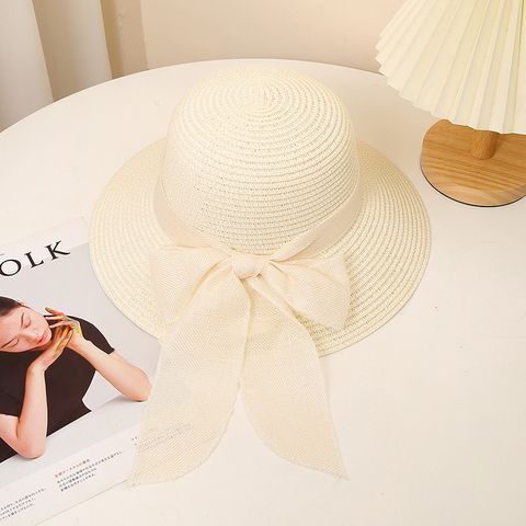 Women's Sweet Pastoral Solid Color Bowknot Wide Eaves Straw Hat
