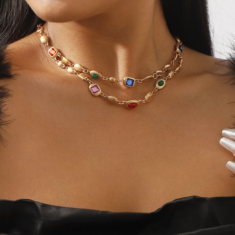 Ethnischer Stil Einfacher Stil Farbblock Legierung Glas Frau Geschichtete Halskette