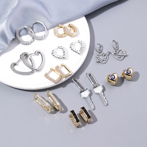 1 Par Casual Estilo Simple Viajar Diariamente Forma De Corazón Llave Esmalte Enchapado Embutido Acero Inoxidable Cobre Circón Chapado En Oro De 18 Quilates. Aretes