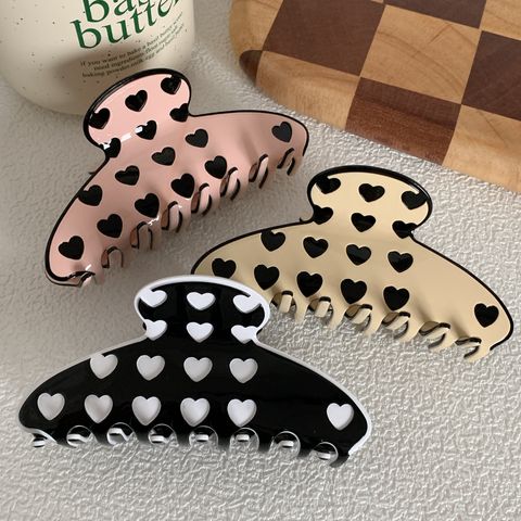 Women's Simple Style Commute Heart Shape Alloy Acetic Acid Sheets Printing Hair Claws