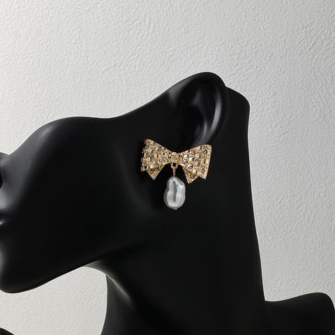 1 Pair Glam Bow Knot Plating Inlay Alloy Artificial Pearls Rhinestones Drop Earrings