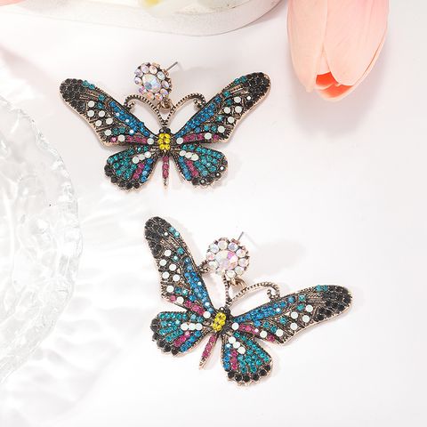 1 Pair Simple Style Classic Style Butterfly Plating Inlay Alloy Rhinestones Gold Plated Drop Earrings