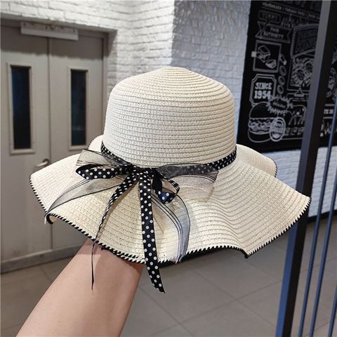 Women's Simple Style Bow Knot Flat Eaves Straw Hat