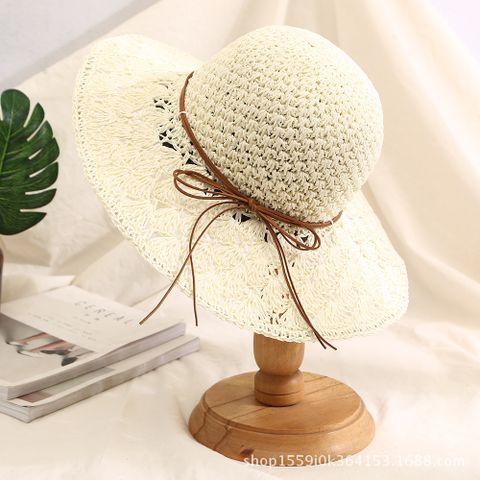 Women's Pastoral Simple Style Solid Color Bowknot Wide Eaves Straw Hat