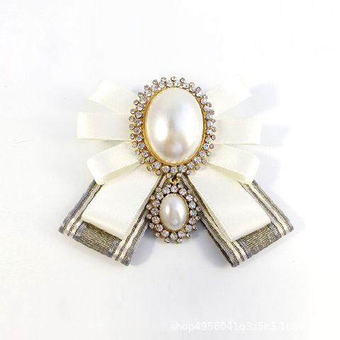 Lady Bow Knot Cloth Plating Inlay Artificial Pearls Artificial Diamond Women's Brooches