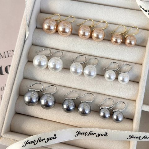1 Par Estilo Ig Elegante Color Sólido Enchapado Embutido Perla De Imitación Aleación Perlas Artificiales Chapado En Oro Pendientes