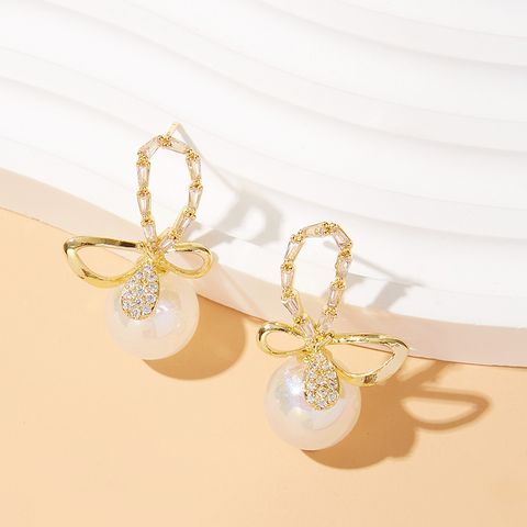 1 Pair Elegant Simple Style Bow Knot Inlay Alloy Artificial Pearls Zircon Drop Earrings