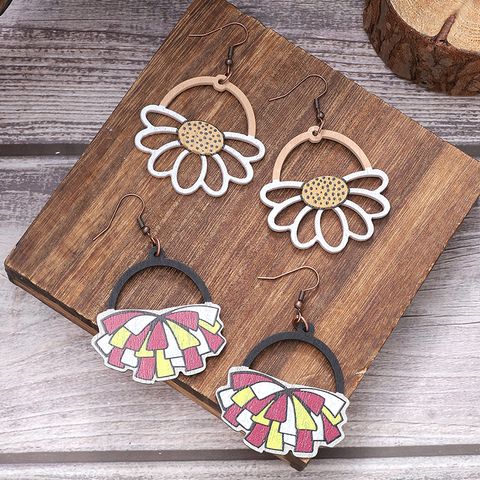 1 Pair Simple Style Flower Hollow Out Wood Drop Earrings