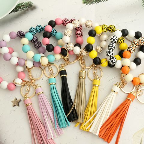 Retro Simple Style Geometric Pu Leather Wood Tassel Unisex Bracelets