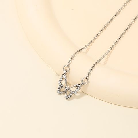Sweet Bow Knot Alloy Plating Inlay Artificial Diamond Women's Pendant Necklace